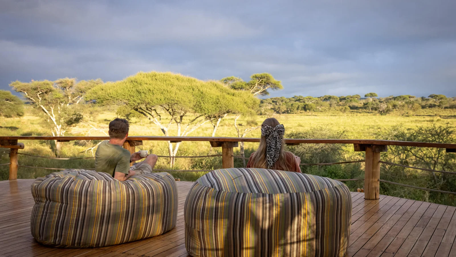 Couple enjoying a romantic honeymoon safari adventure in Africa with Boots in the Jungle Safaris.