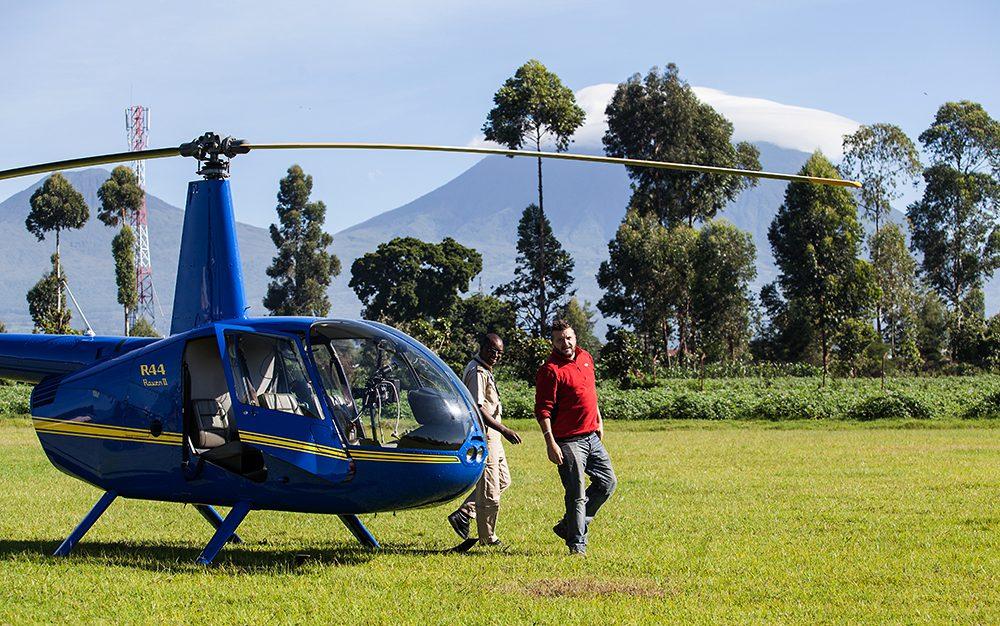 Helicopter transfers landing for a trek with Boots in the Jungle Safaris