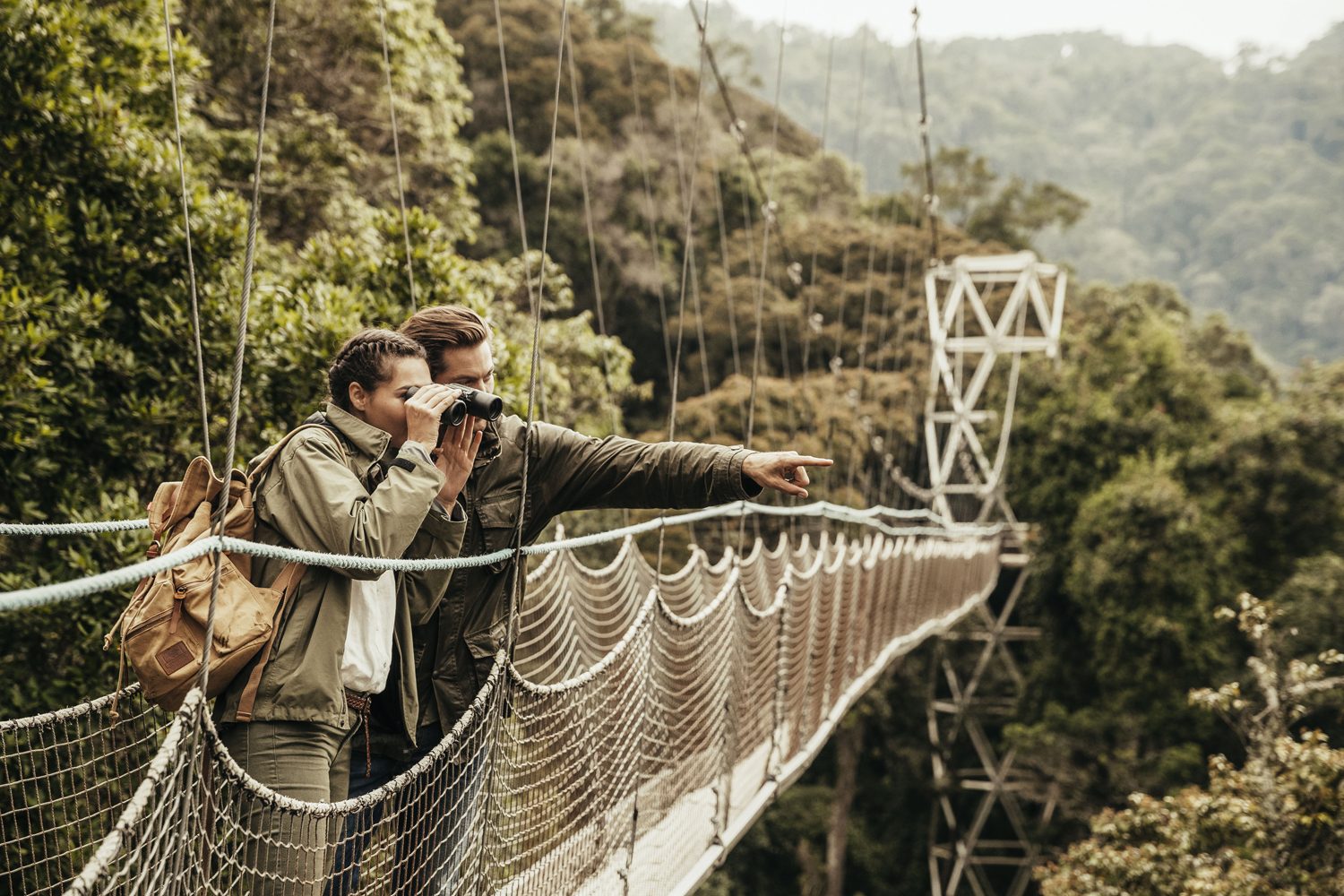 Couple enjoying birdwatching at Nyungwe Forest National Park