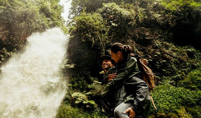 Couple enjoying a safari tour with Boots in the Jungle Safaris
