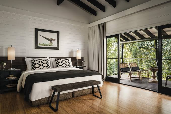 Luxury One&Only lodge bedroom offering elegant accommodation during a premium Rwanda safari experience.