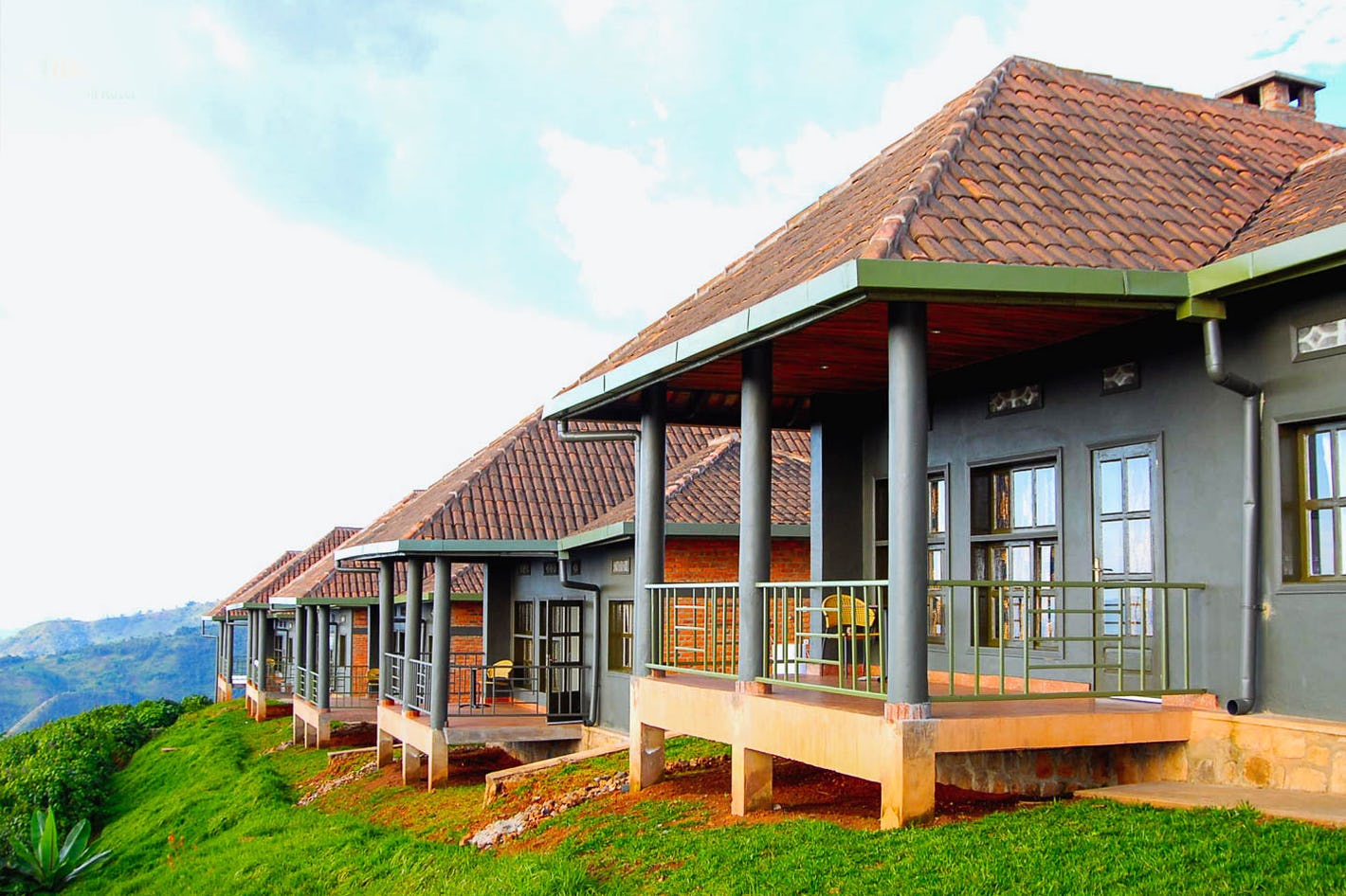 Side view of Nyungwe Top Hill Lodge surrounded by scenic Rwanda landscapes near Nyungwe Forest.
